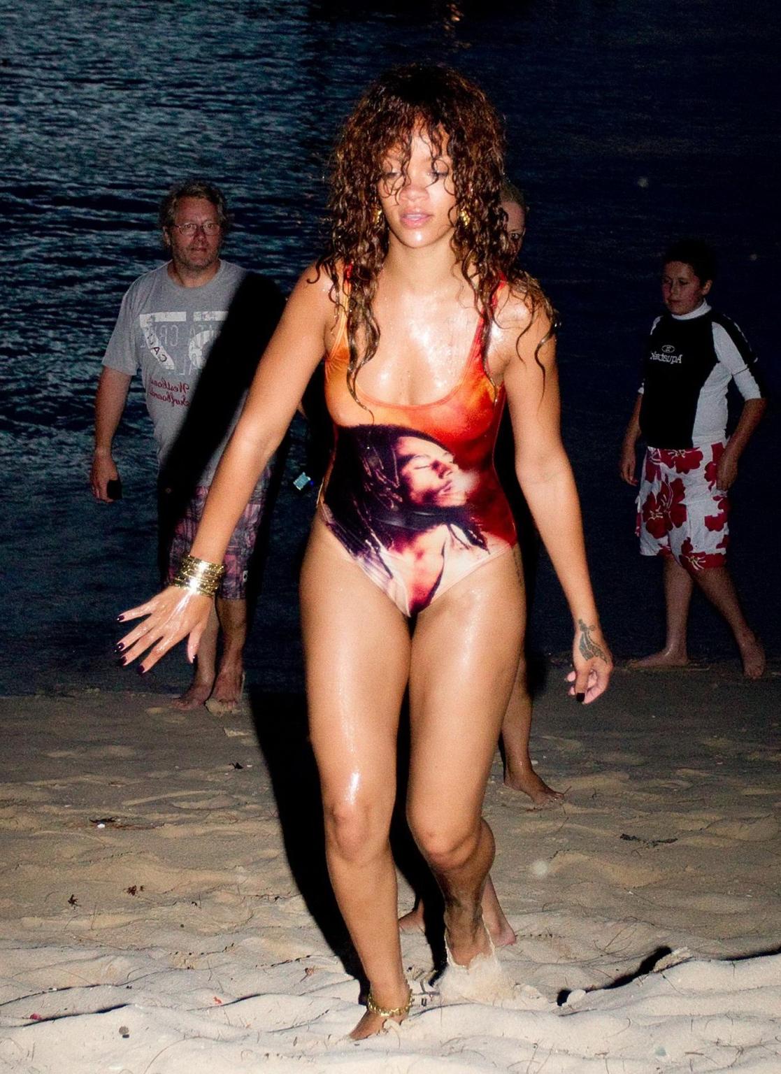 16P Rihanna in sexy swimsuit going for a dusk swim in Barbados