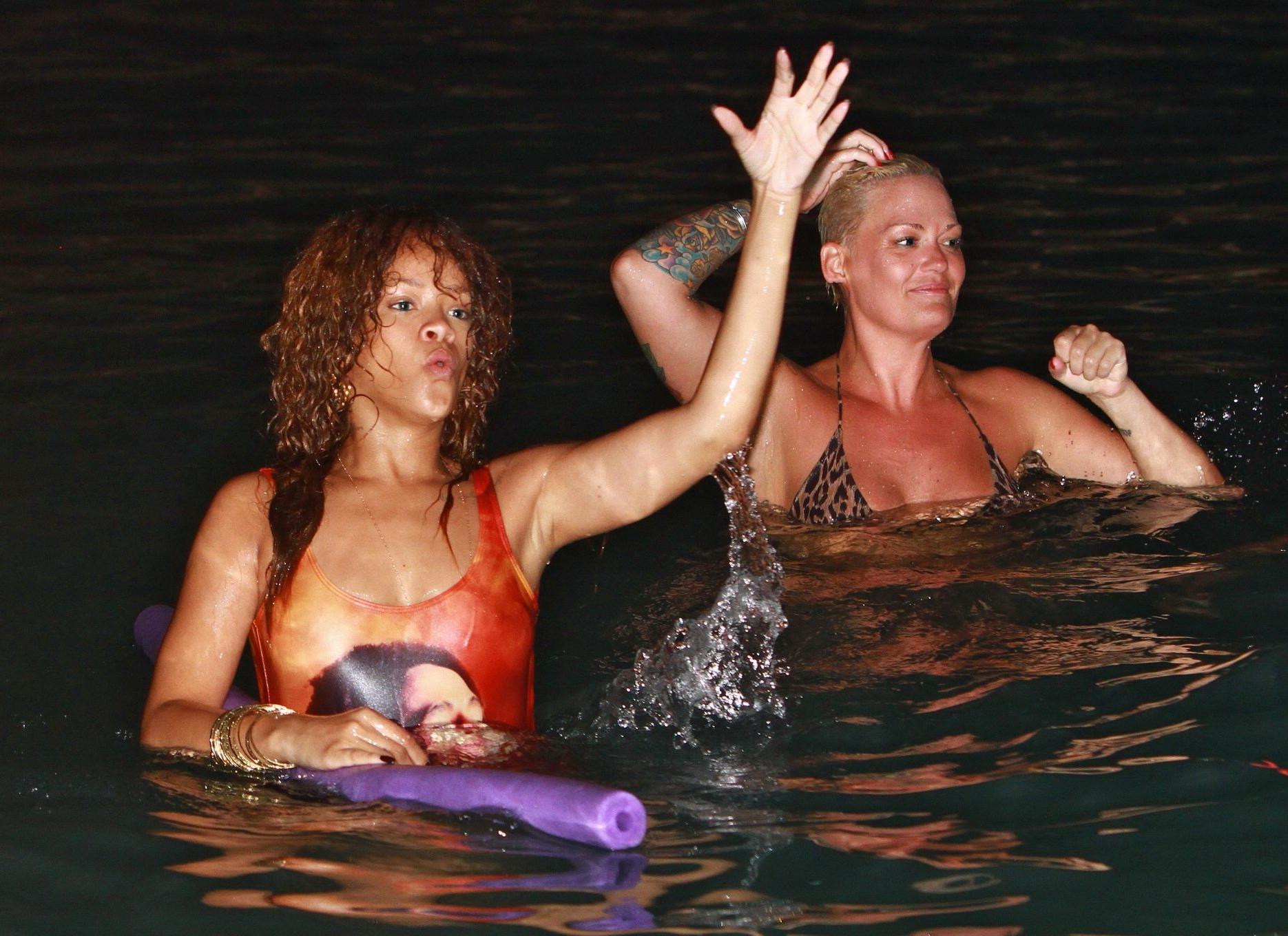 16P Rihanna in sexy swimsuit going for a dusk swim in Barbados
