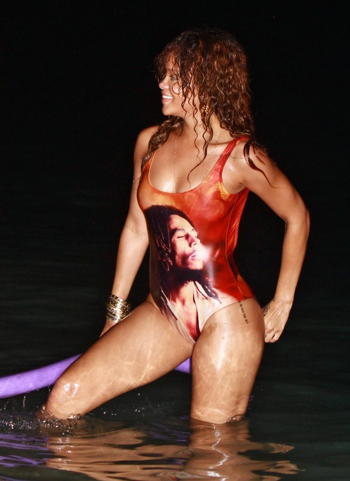 16P Rihanna in sexy swimsuit going for a dusk swim in Barbados