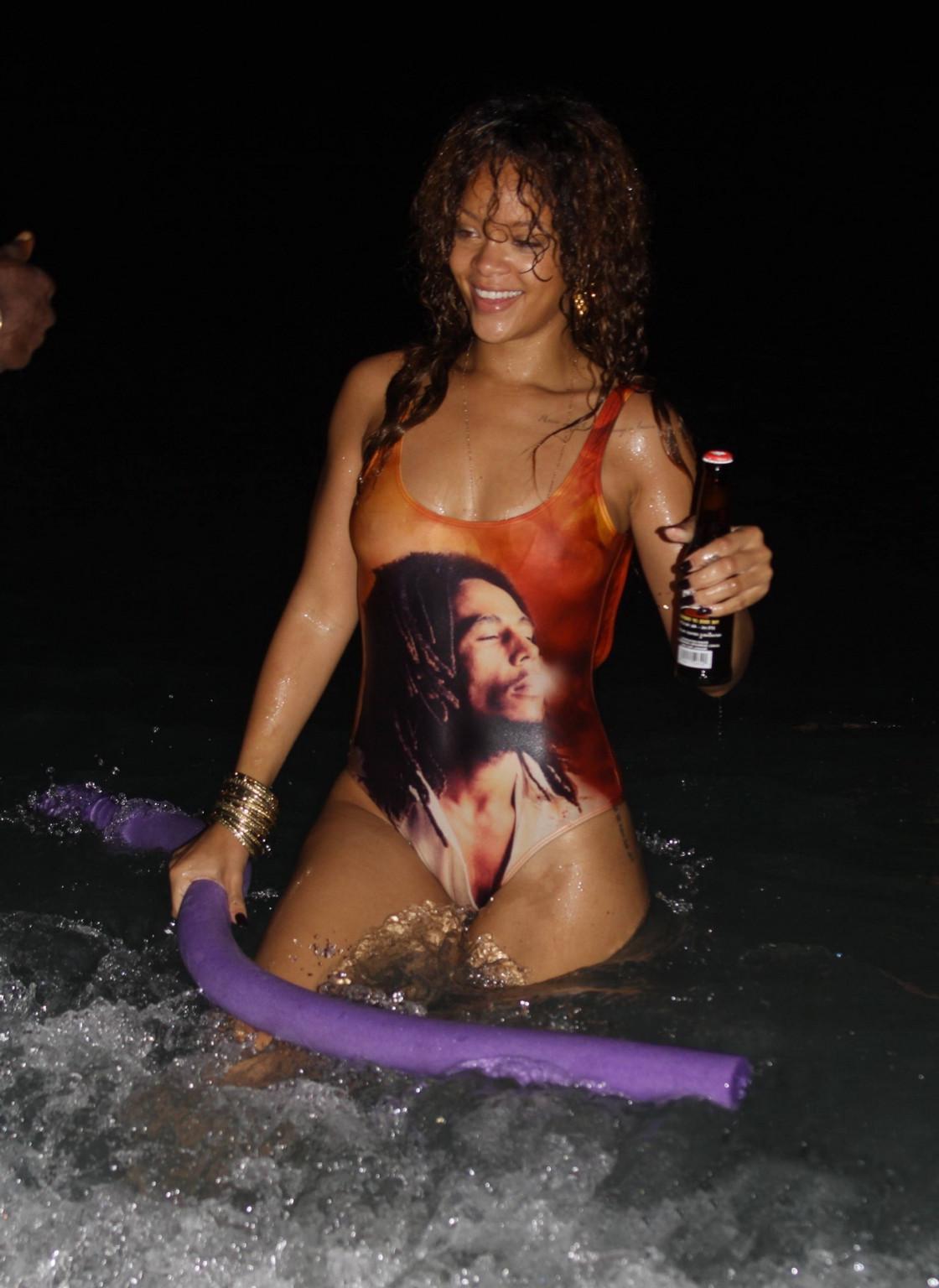 16P Rihanna in sexy swimsuit going for a dusk swim in Barbados