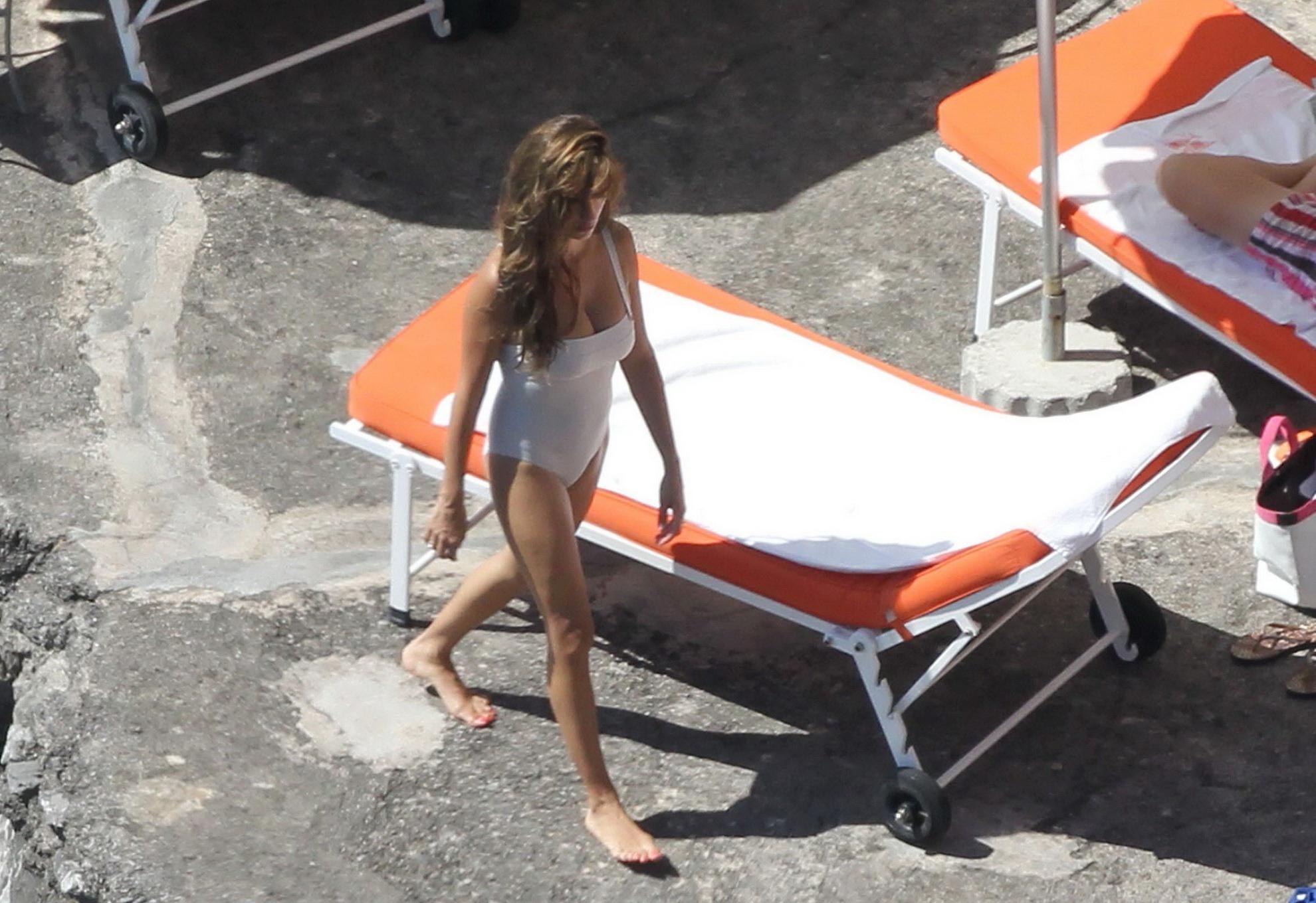 16P Penelope Cruz shows off her curvy body wearing sexy white swimsuit