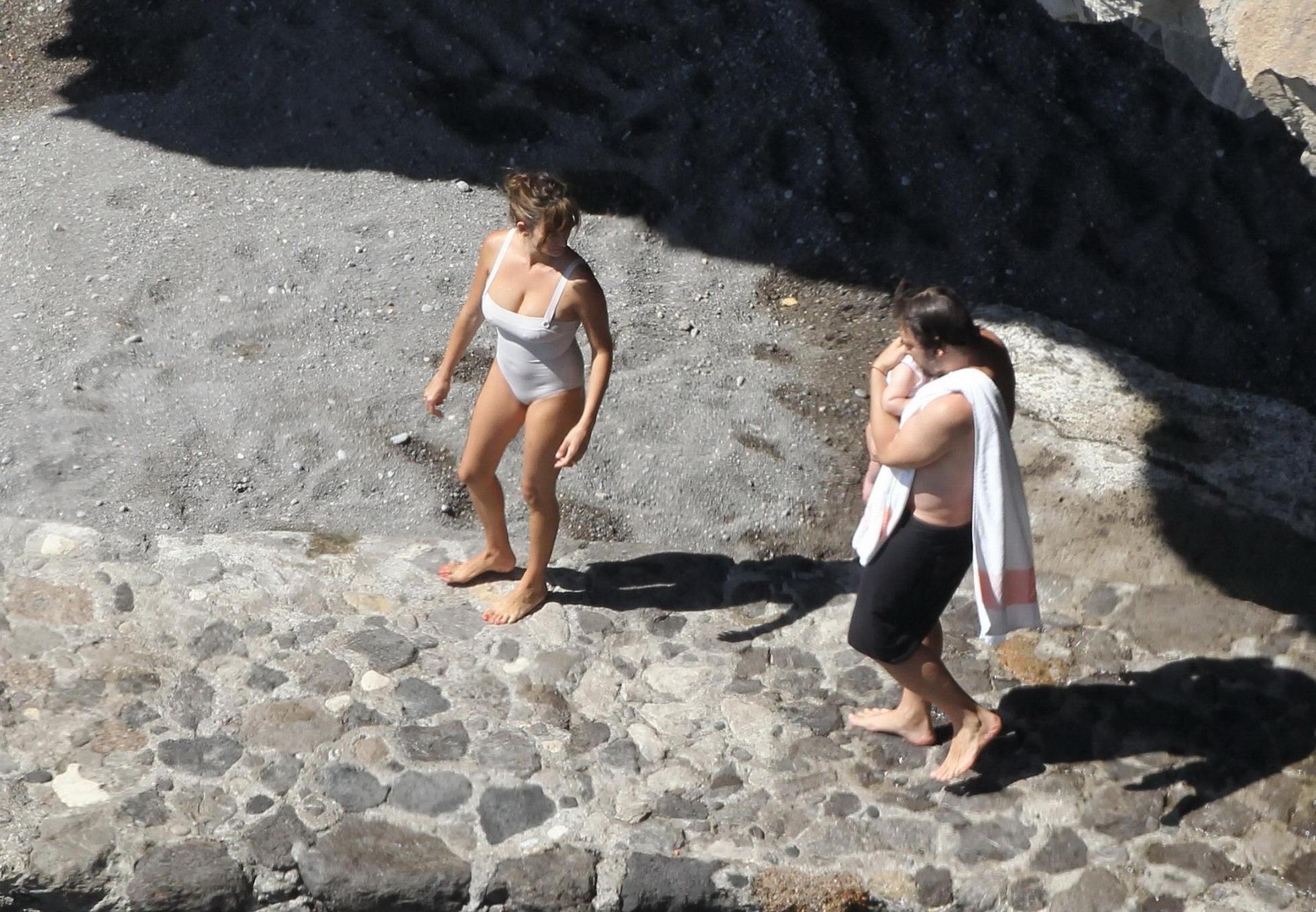 16P Penelope Cruz shows off her curvy body wearing sexy white swimsuit