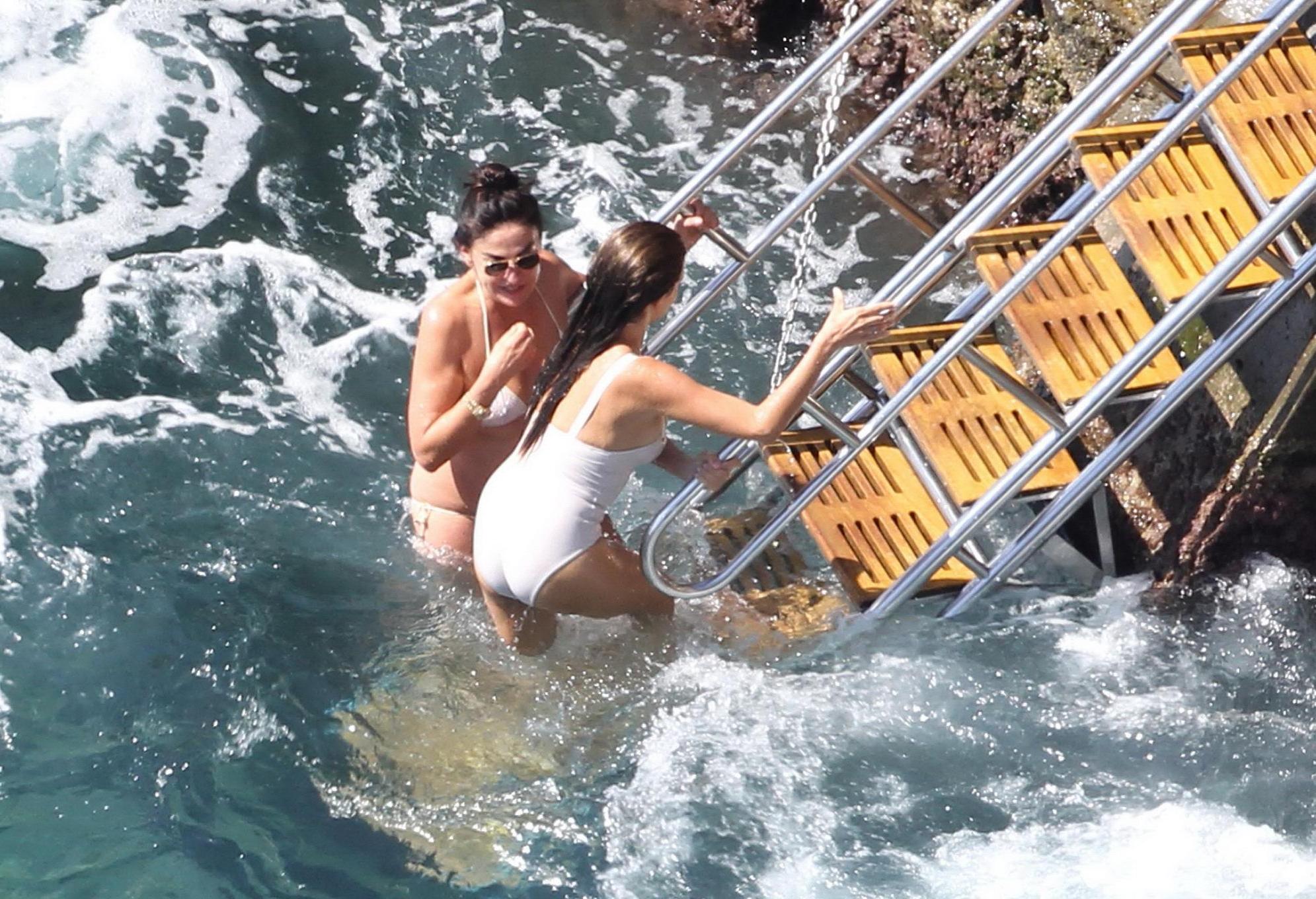 16P Penelope Cruz shows off her curvy body wearing sexy white swimsuit