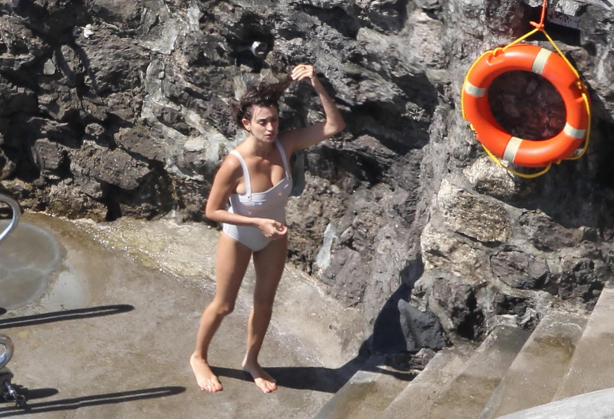 16P Penelope Cruz shows off her curvy body wearing sexy white swimsuit