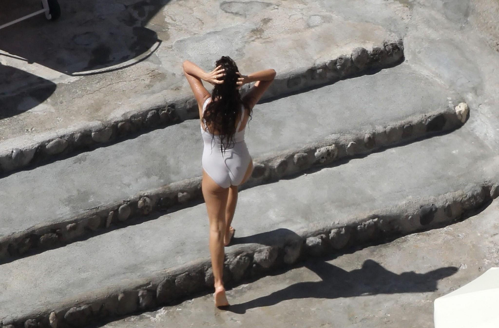 16P Penelope Cruz shows off her curvy body wearing sexy white swimsuit