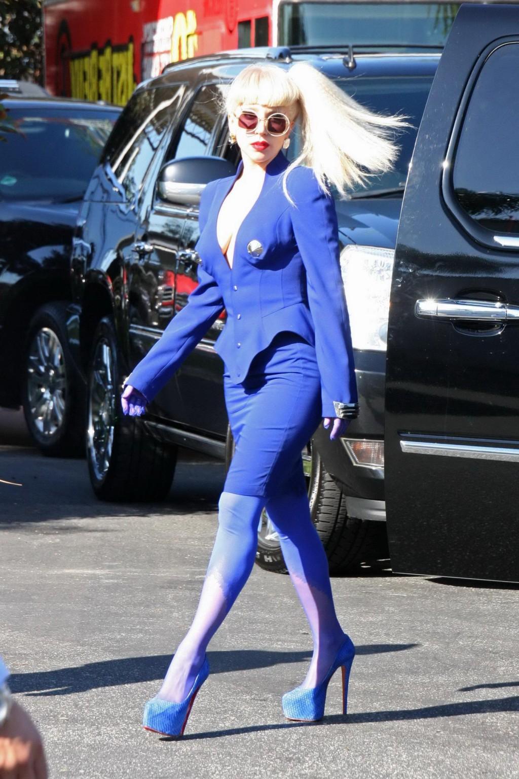 16P Lady Gaga shows side-boob wearing sexy blue outfit outside Amp Radio in LA