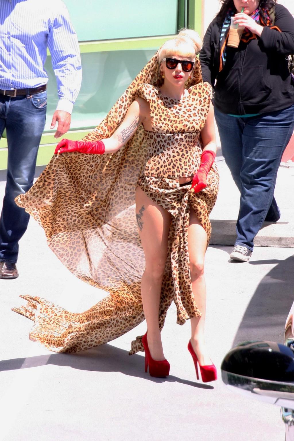 16P Lady Gaga shows side-boob wearing sexy blue outfit outside Amp Radio in LA