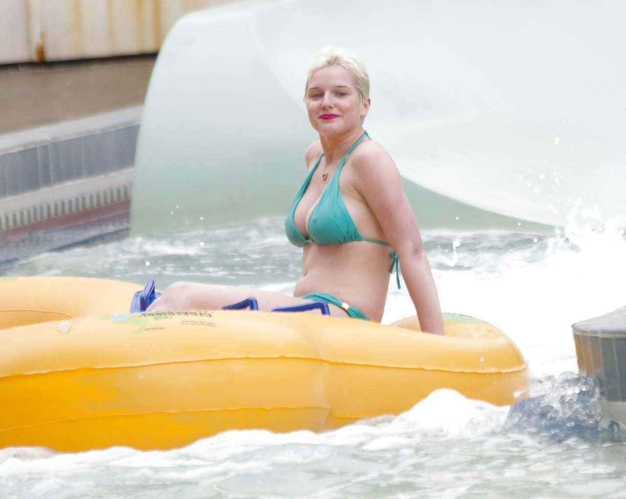 16P Helen Flanagan hint of nipple slip in blue bikini on beach paparazzi pictures