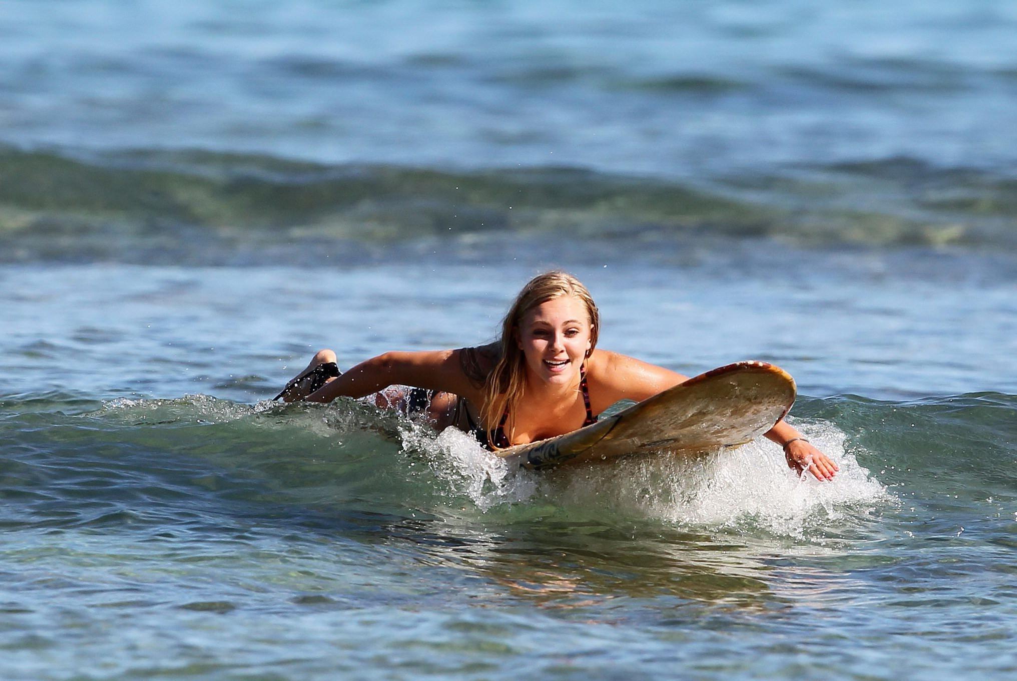 16P AnnaSophia Robb in bikini surfing on a Hawaiian beach