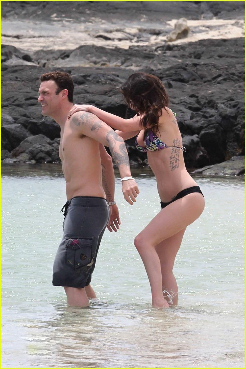 16P Megan Fox showing off her bikini body on a Hawaiian beach
