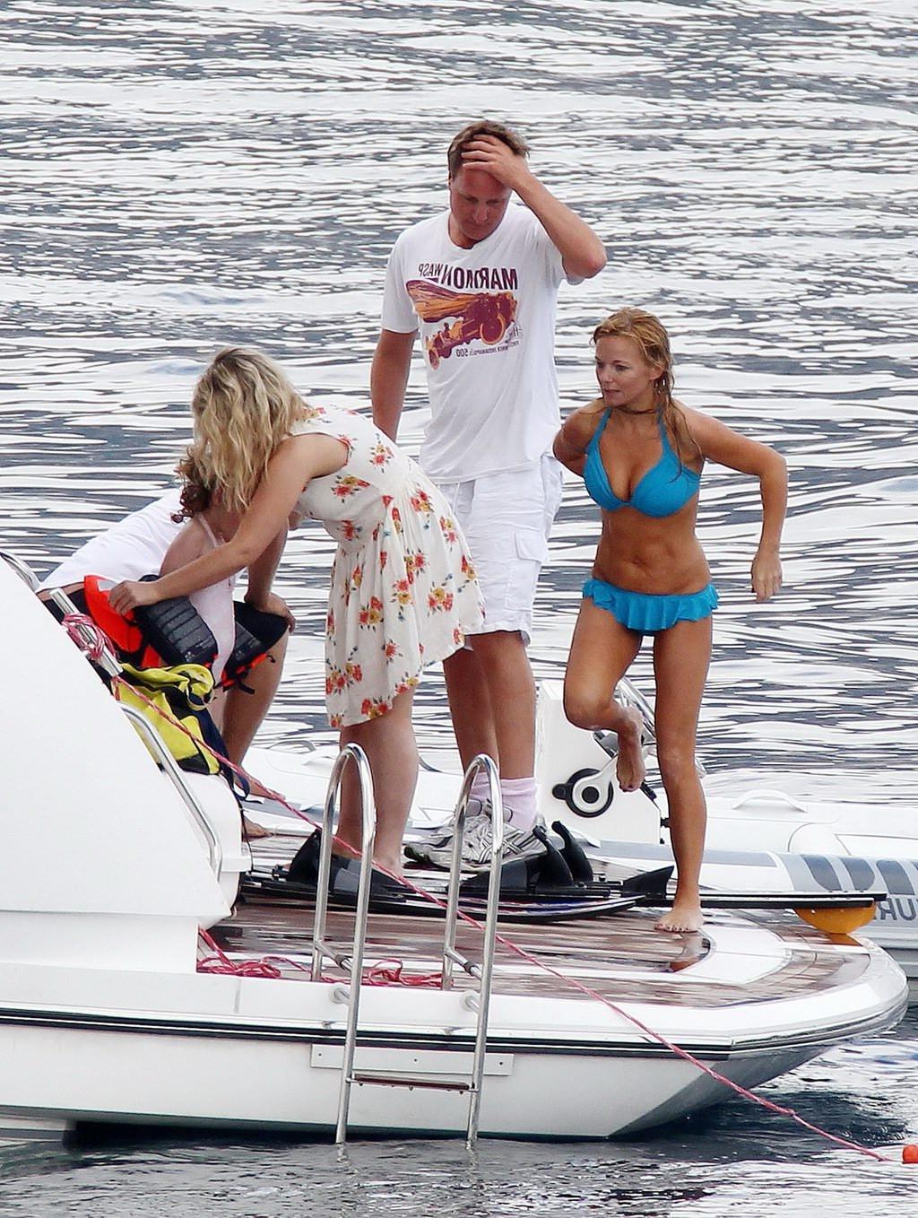 16P Busty Geri Halliwell caught topless on a Boat in St. Tropez