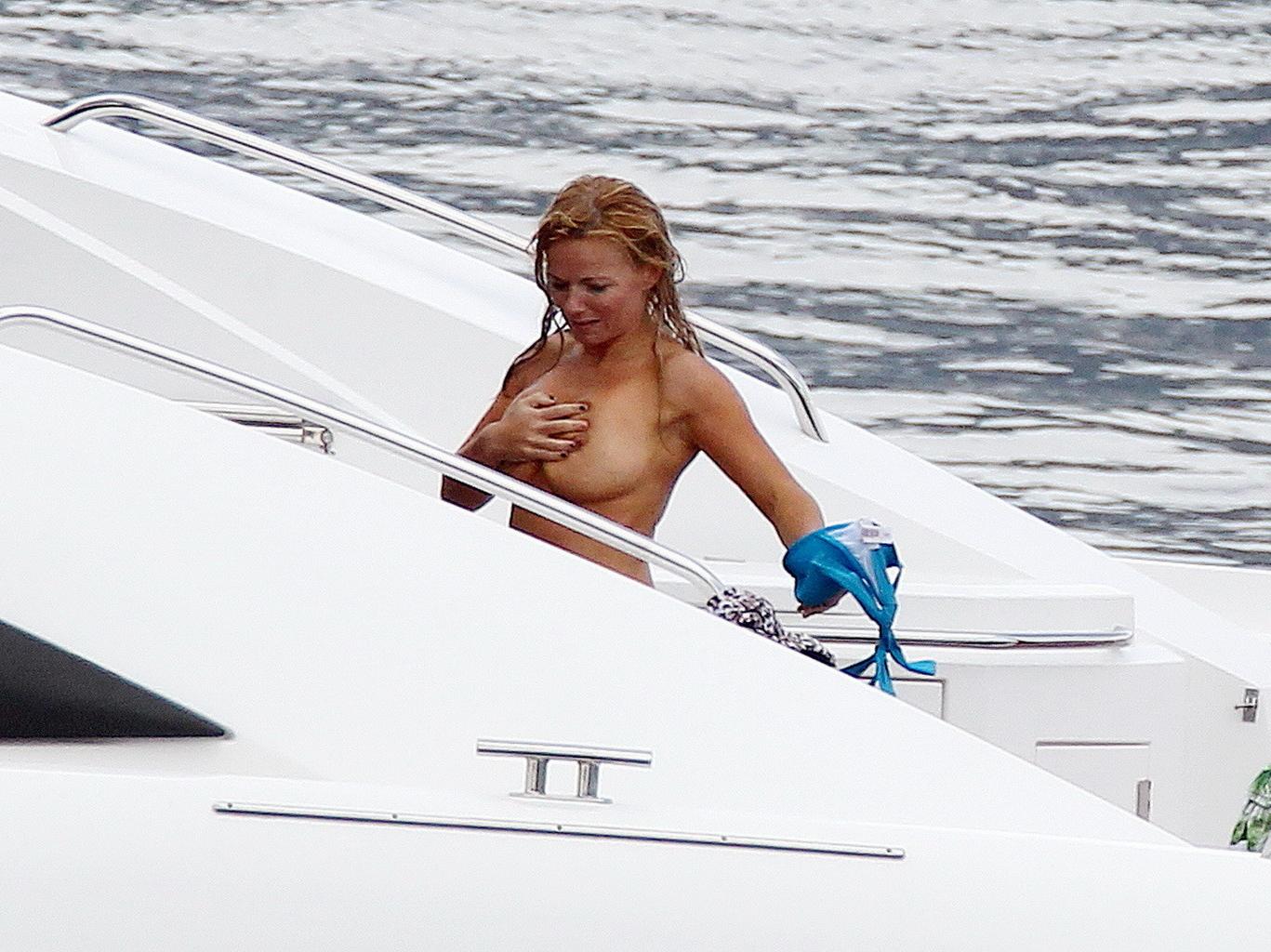 16P Busty Geri Halliwell caught topless on a Boat in St. Tropez