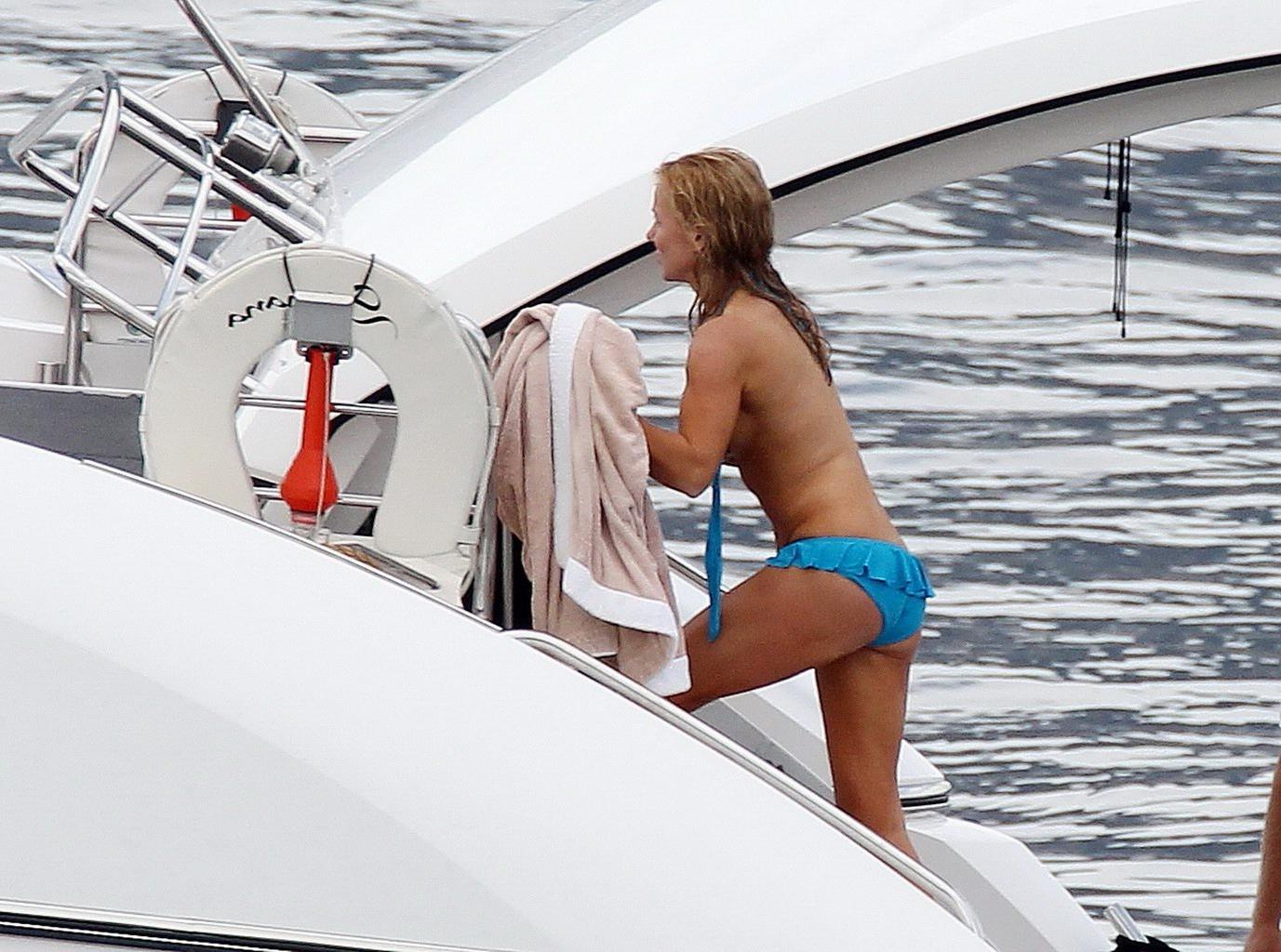 16P Busty Geri Halliwell caught topless on a Boat in St. Tropez