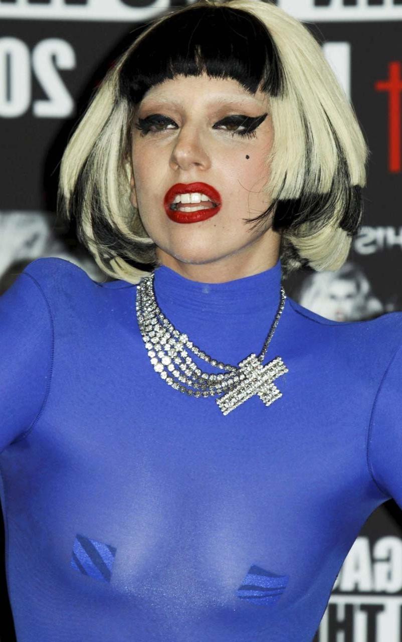 16P Lady Gaga in see thru blue outfit exposing her nice boobs paparazzi pictures