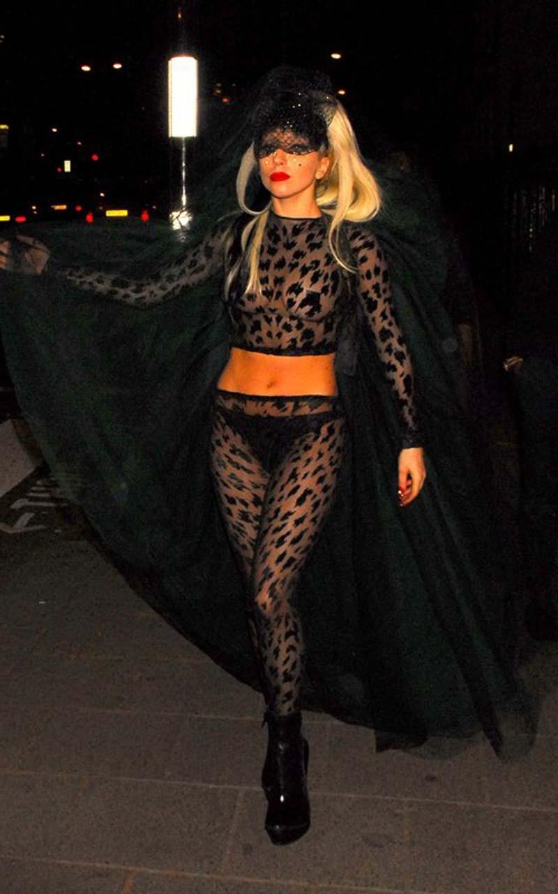 16P Lady Gaga in see thru blue outfit exposing her nice boobs paparazzi pictures