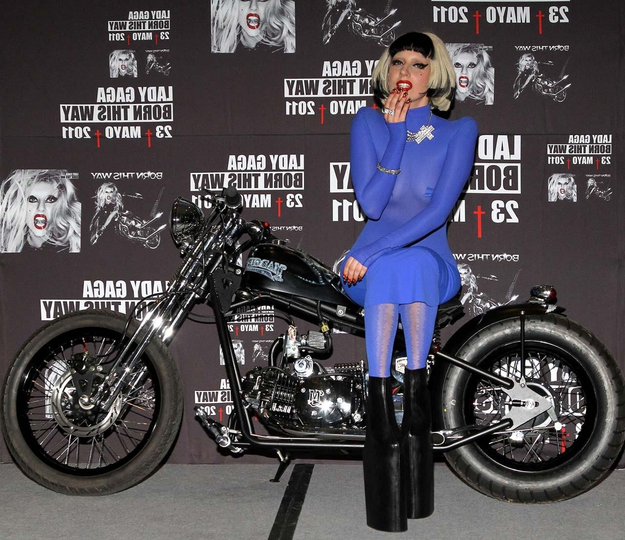 16P Lady Gaga in see thru blue outfit exposing her nice boobs paparazzi pictures