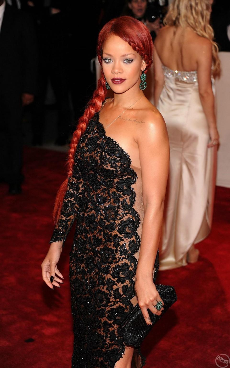 16P Rihanna wearing black lace dress at Costume Institute Gala in NYC