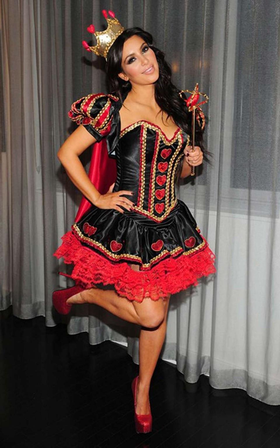 10P Kim Kardashian looking very sexy in Halloween and leopard print costume