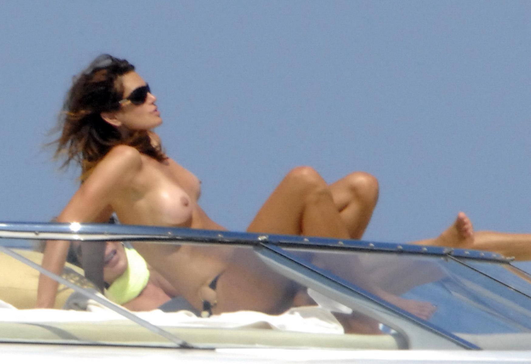 16P Cindy Crawford topless sunbathing on a yacht at French Riviera