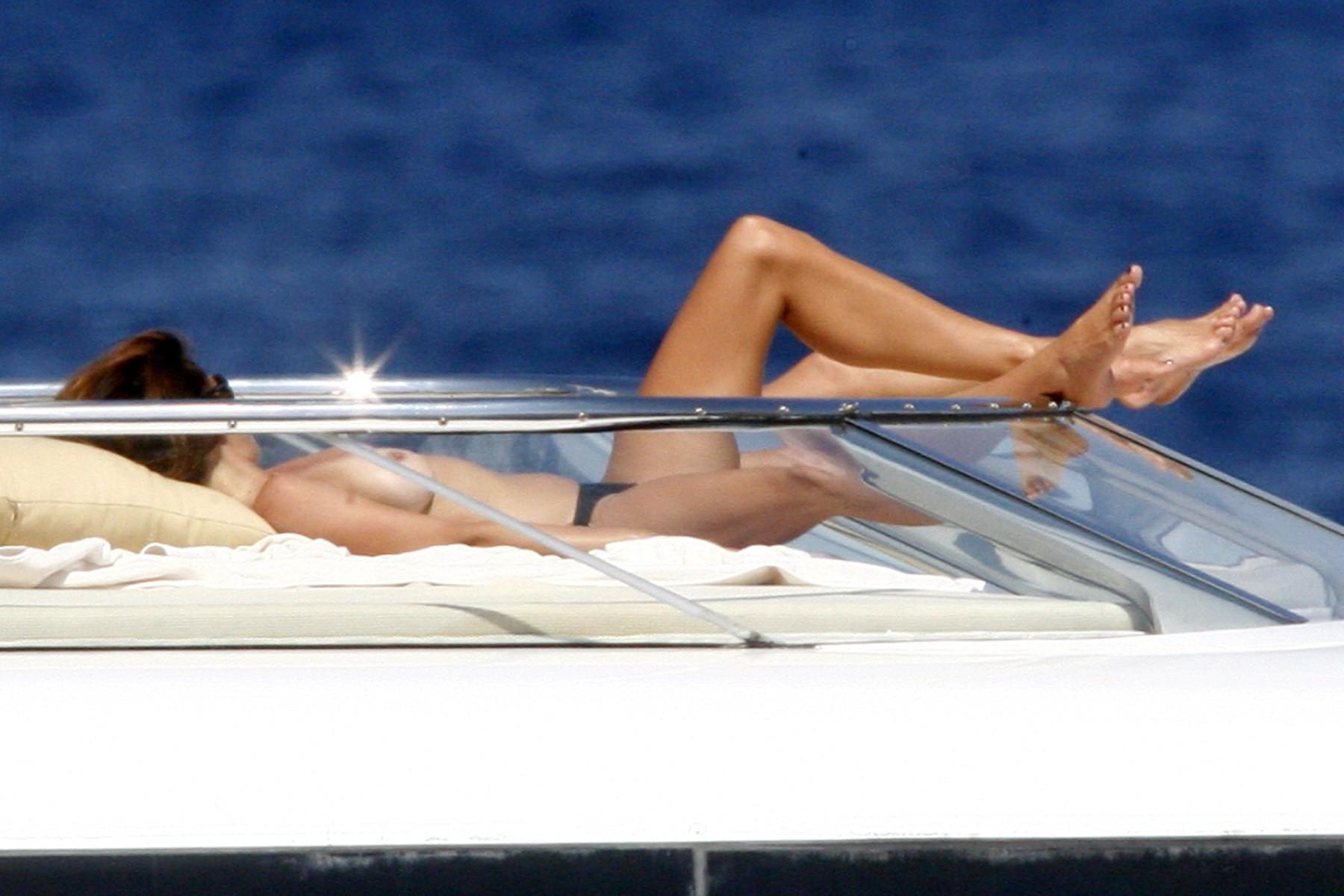 16P Cindy Crawford topless sunbathing on a yacht at French Riviera