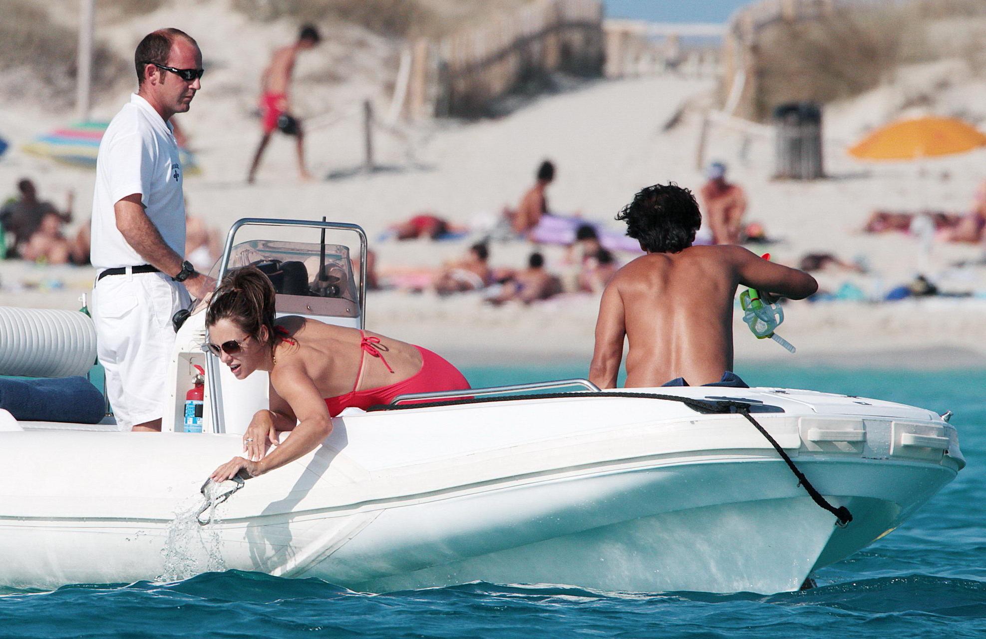16P Elizabeth Hurley busty  ass shots wearing swimsuit on Valentino's yacht in Ibiza