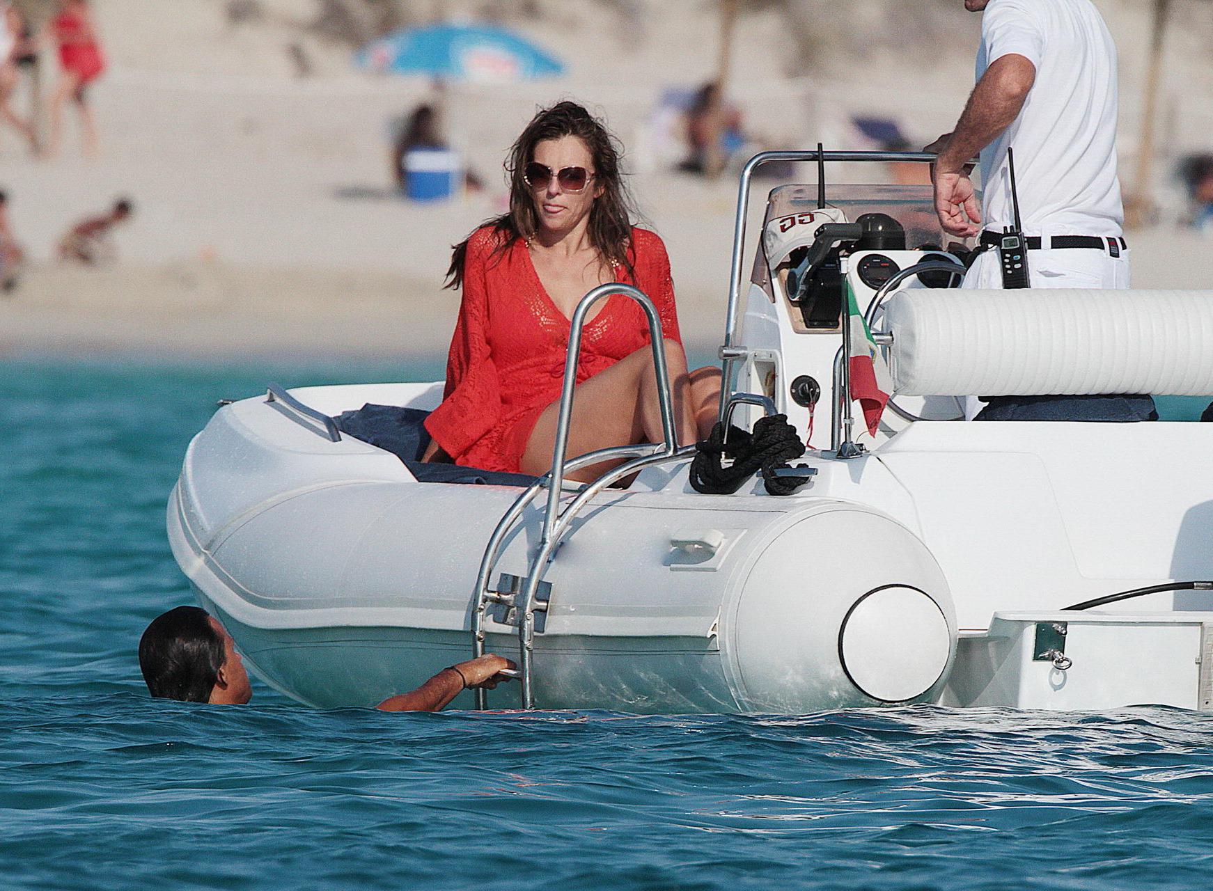 16P Elizabeth Hurley busty  ass shots wearing swimsuit on Valentino's yacht in Ibiza