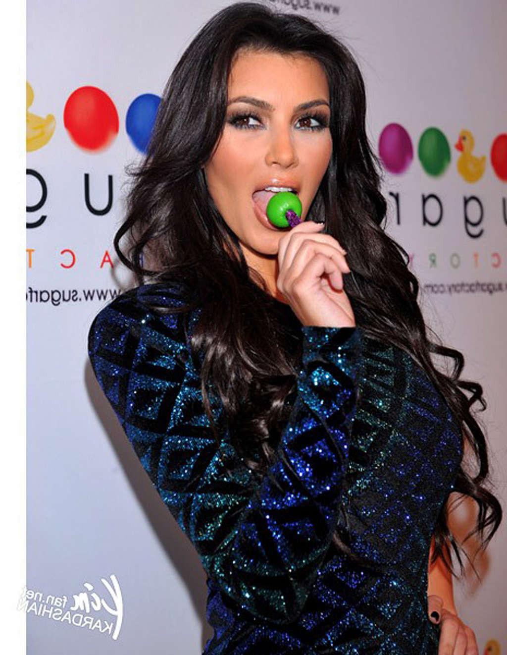 16P Kim Kardashian licking lollipop on a extremely sexy way hot photos