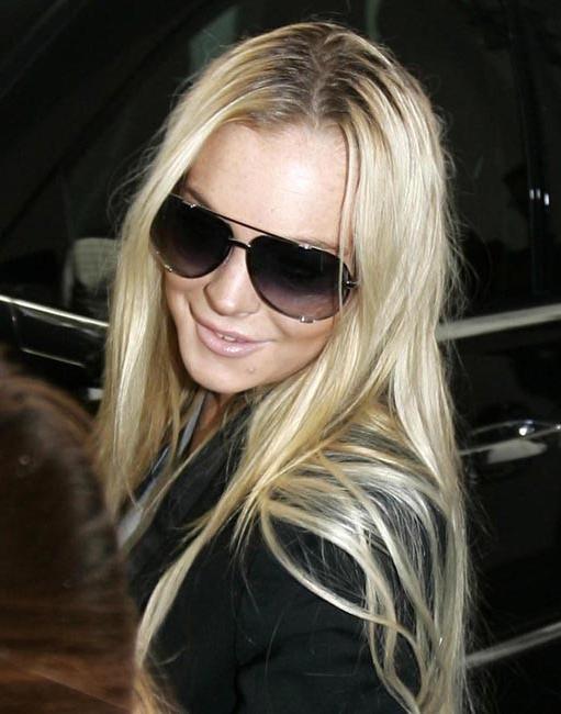15P Lindsay Lohan sexy legs in black stockings