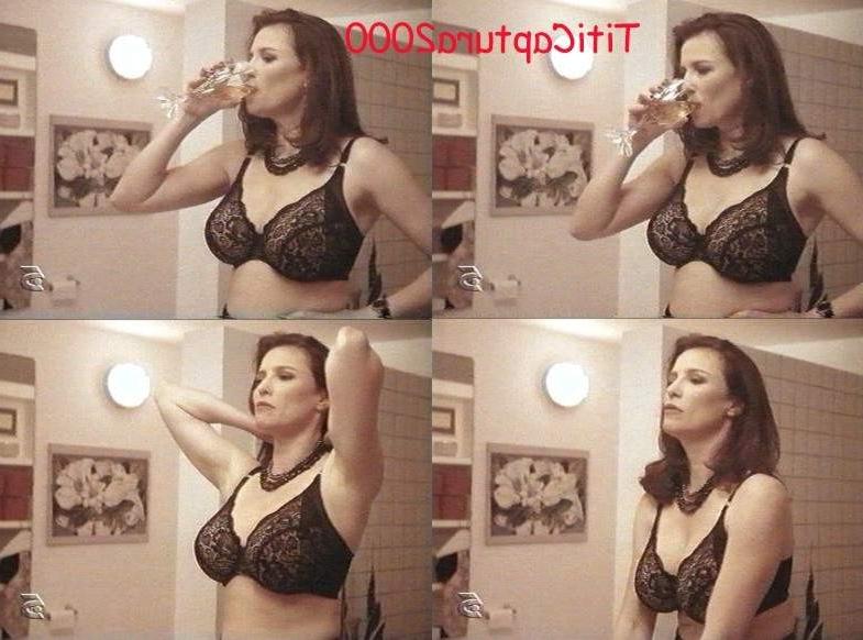 15P busty milf actress Mimi Rogers nude