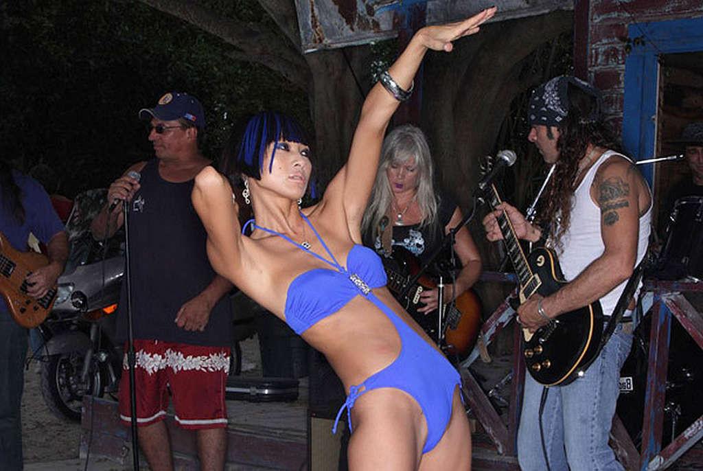 10P Bai Ling exposing her nice tits and posing sexy in blue swimsuit
