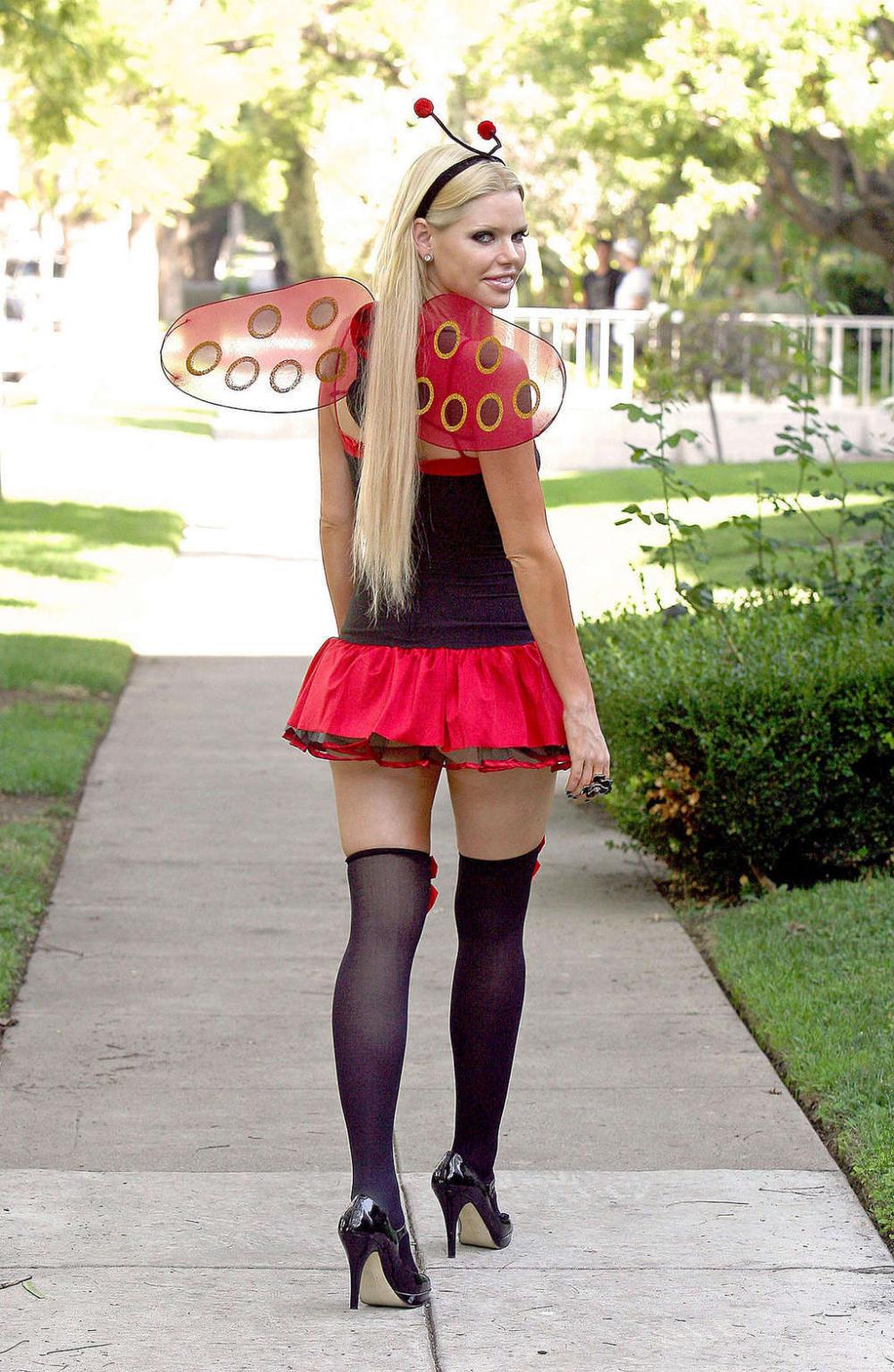 16P Sophie Monk exposing her nice tits to paparazzi and posing sexy in helloween cos