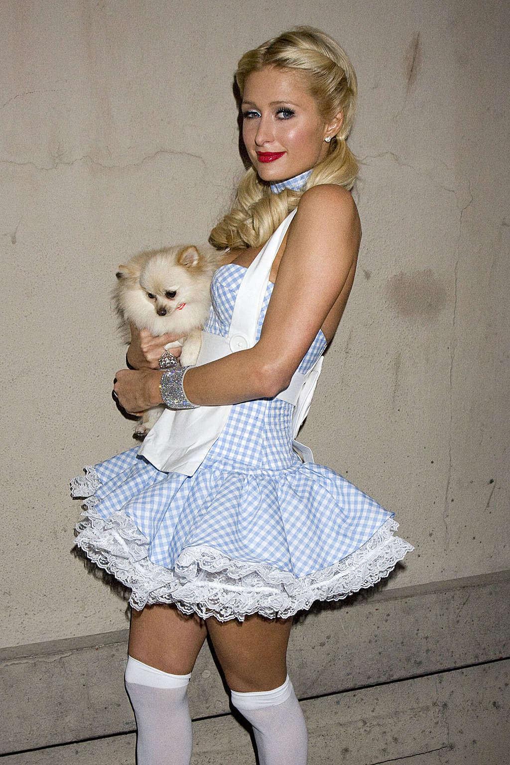 16P Paris Hilton looking hot in helloween costume and show tits and pussy
