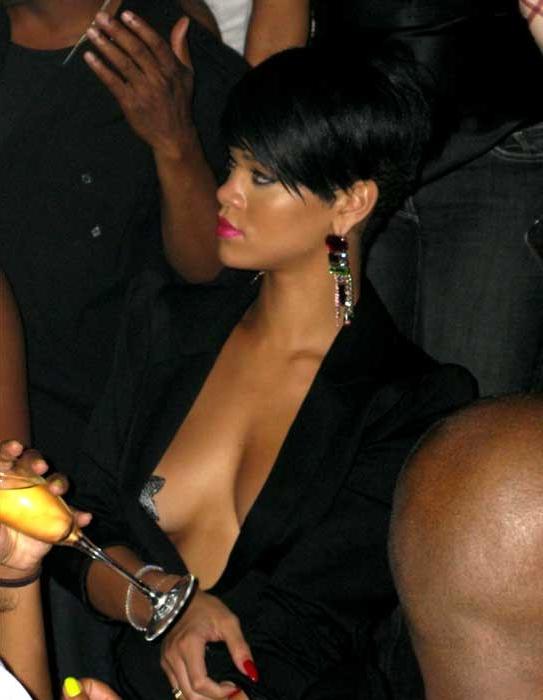 15P Rihanna looking her sexy nude body in the mirror