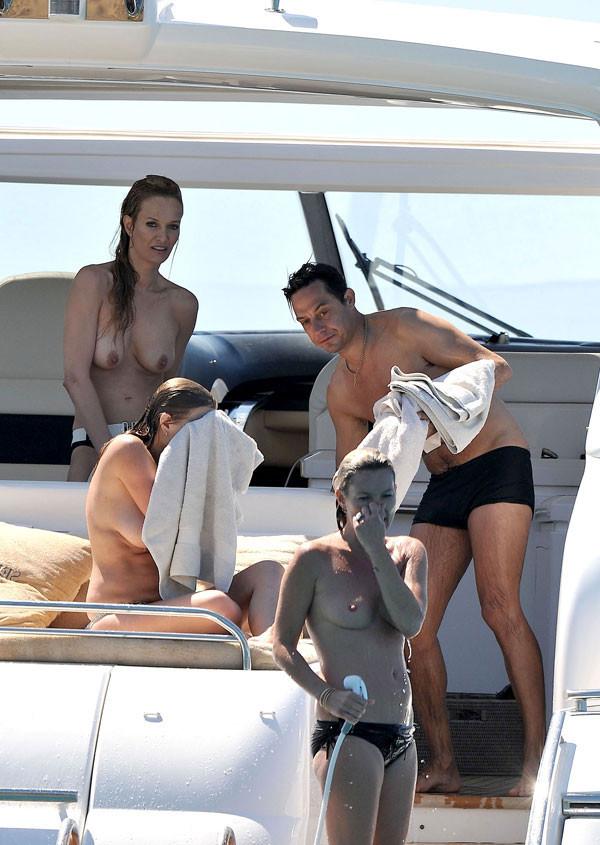 15P Kate Moss showing great topless on a boat