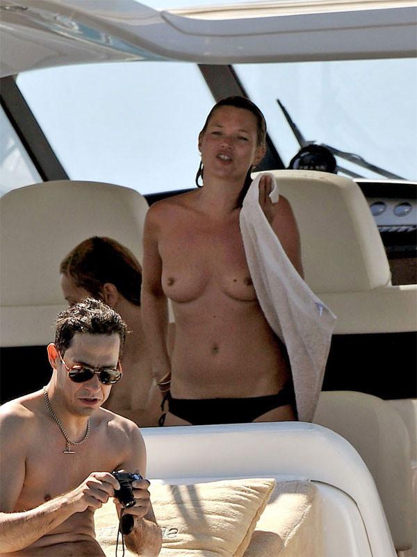 15P Kate Moss showing great topless on a boat