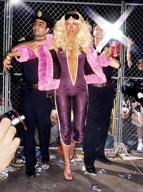 15P Paris Hilton showing her great tits in see thru top and on boat