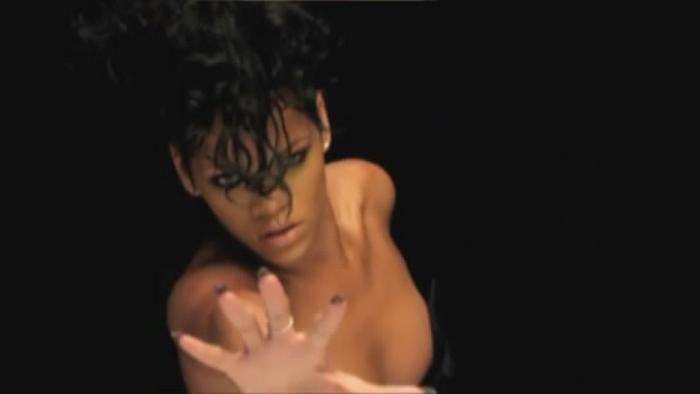 15P Rihanna shows her perky cleavage and naughty body