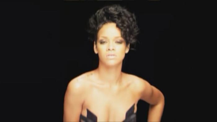 15P Rihanna shows her perky cleavage and naughty body
