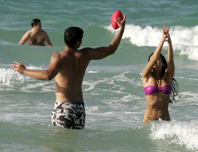 16P Jessica Alba playing football in bikini on beach and showing her tits