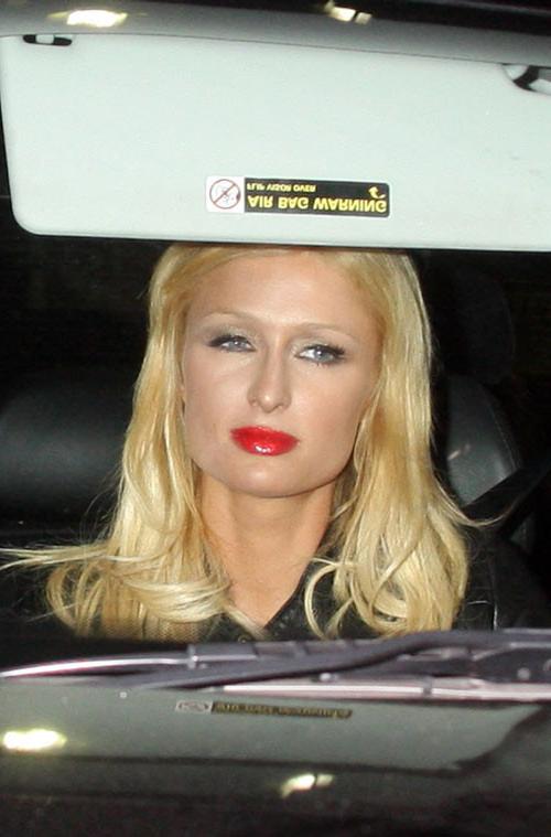16P Paris Hilton posing very sexy in blue violet bikini