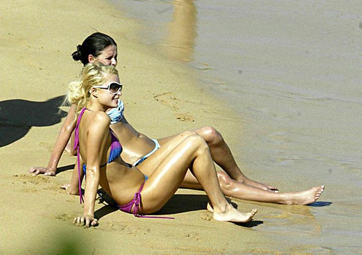 16P Paris Hilton posing very sexy in blue violet bikini