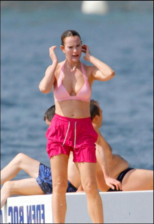 16P Carole Bouquet showing her nice big tits on boat