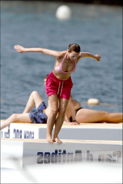 16P Carole Bouquet showing her nice big tits on boat