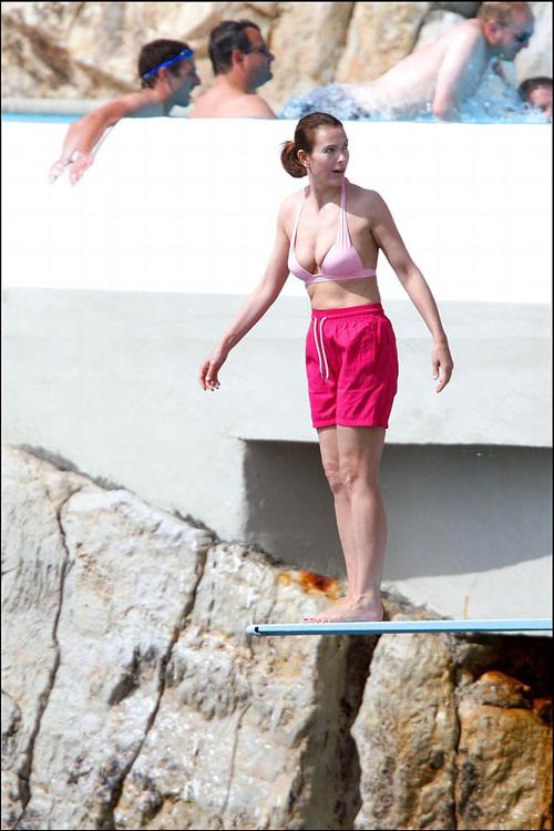 16P Carole Bouquet showing her nice big tits on boat