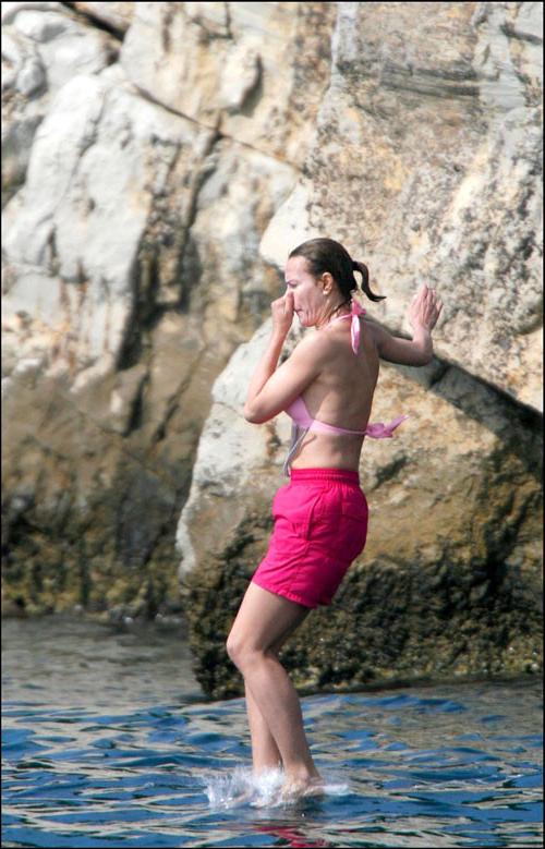 16P Carole Bouquet showing her nice big tits on boat