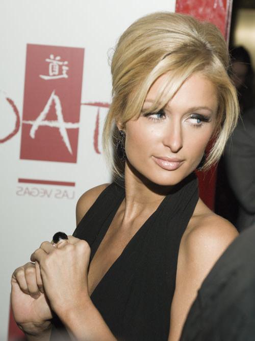 16P Paris Hilton showing her nice small tits on boat