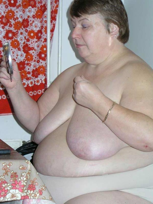 16P Big fat old granny showing her naked huge body