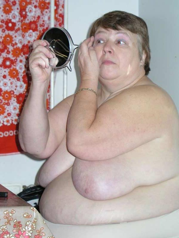 16P Big fat old granny showing her naked huge body