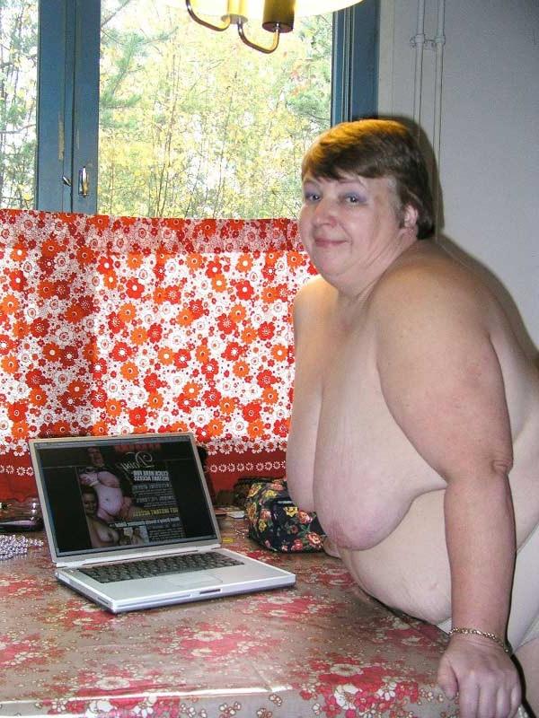 16P Big fat old granny showing her naked huge body