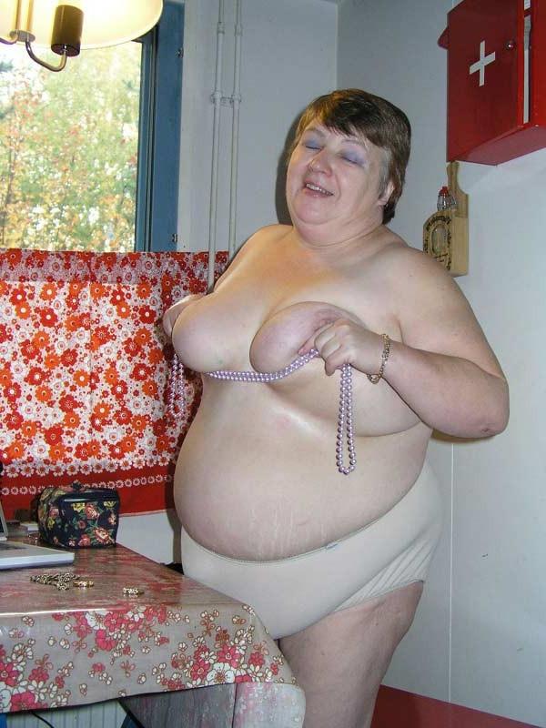 16P Big fat old granny showing her naked huge body